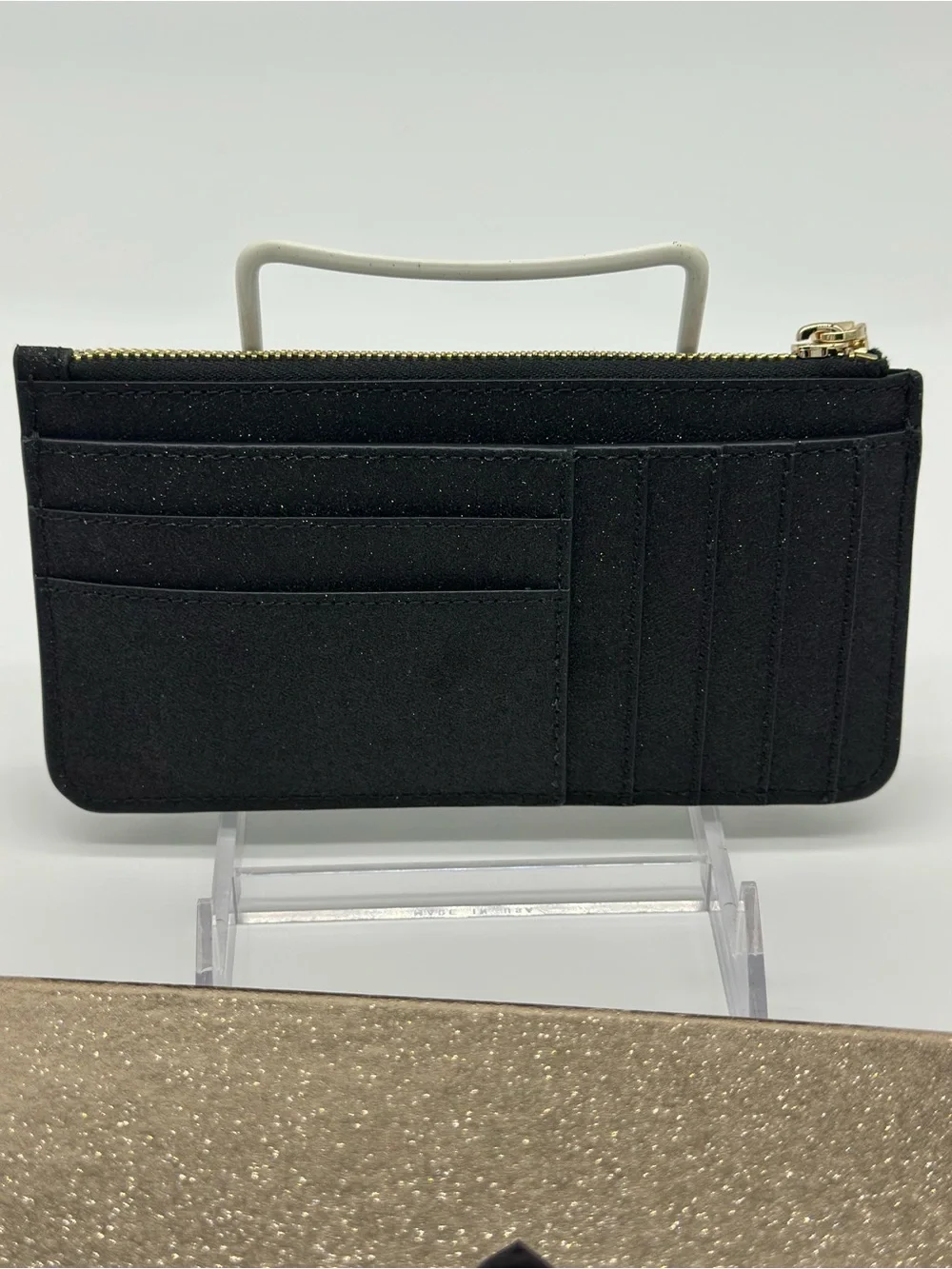 kate spade Gold Glitter Wristlet with Subtle Black Label